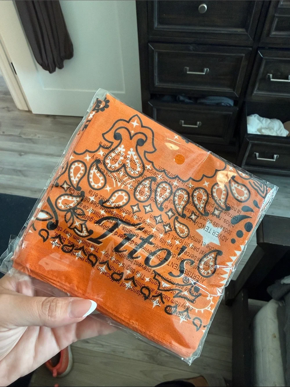Tito’s Orange Paisley Cotton Bandana with Black Print